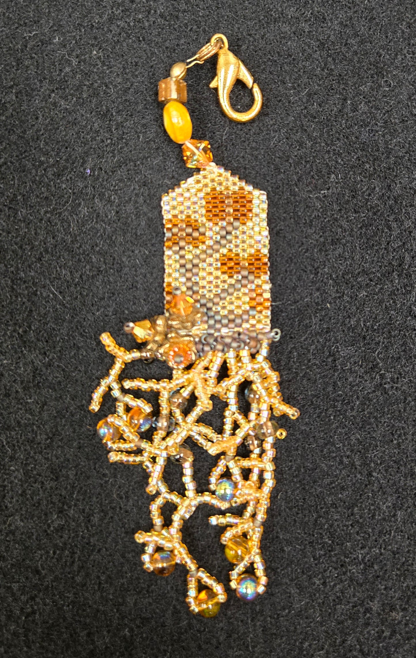 Brown beaded fob - model